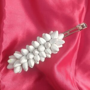 Artificial jasmine buds white floral hair clip with metal barrette on pink background