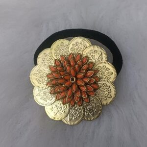 Gold-tone Kundan coin hair band with orange enamel floral design and black elastic