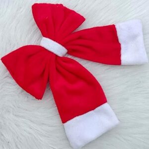 Red and white Santa-themed long-tail bow hair clip on a plain background.