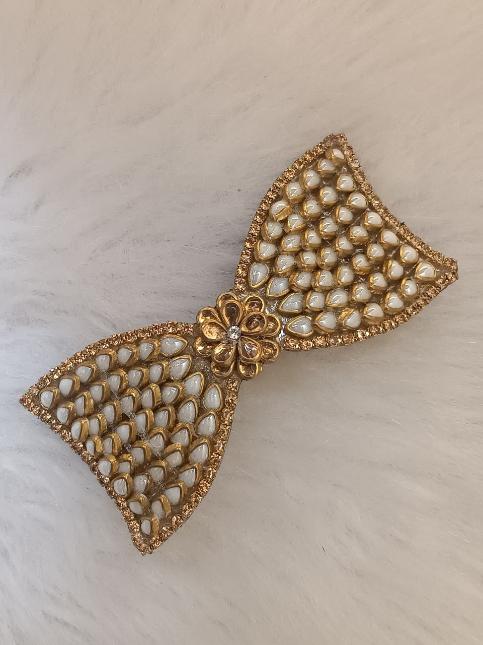 kundan bow design gold tone barrette hair clip with white stone detailing kundan bow design gold tone barrette hair clip with white stone detailing