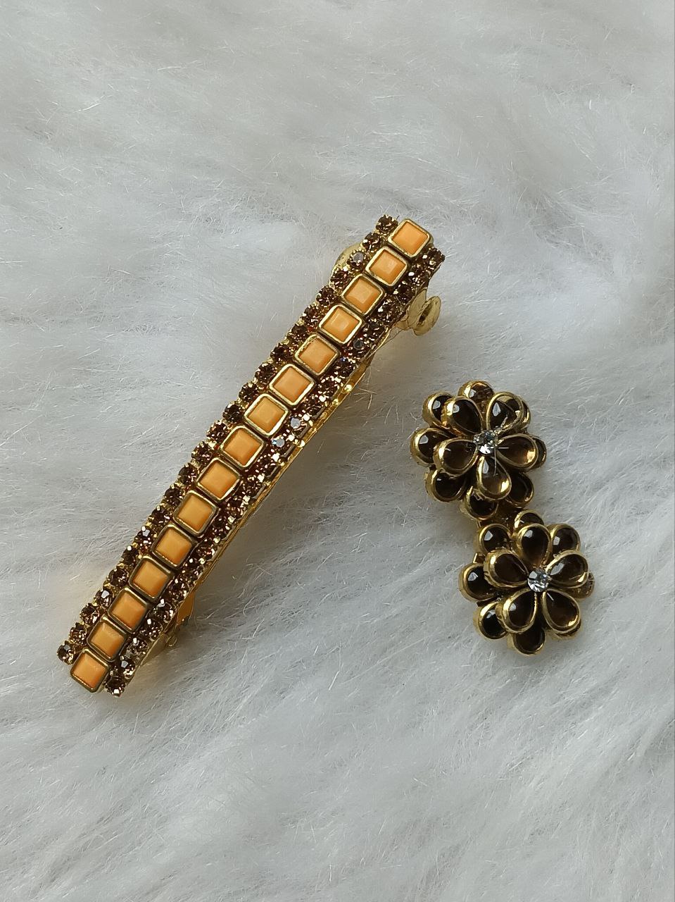 Orange Stone 2.07 Inch Barrette Hair Clip and Floral Saree Pin Set Gold-tone orange stone barrette hair clip with matching floral saree pin on soft background