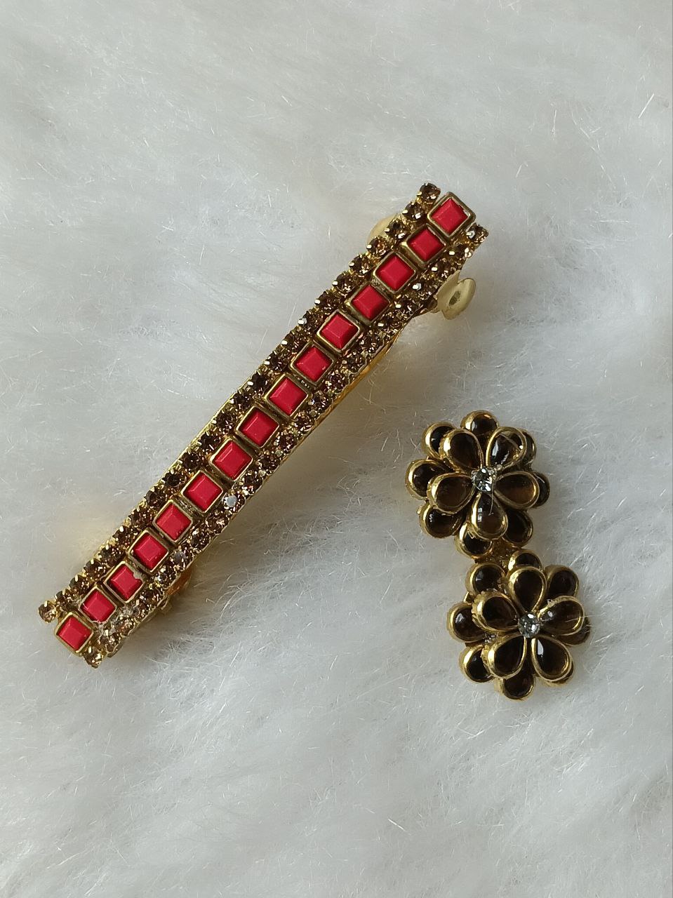 Red Stone 2.07 Inch Barrette Hair Clip and Floral Saree Pin Set Gold-tone red stone barrette hair clip with matching floral saree pin on soft background