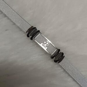 Stylish silver mesh bracelet with metallic centerpiece and black accents for men