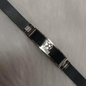 Stylish black strap bracelet with metallic centerpiece for men