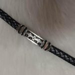 Black braided bracelet with metallic detailing for men